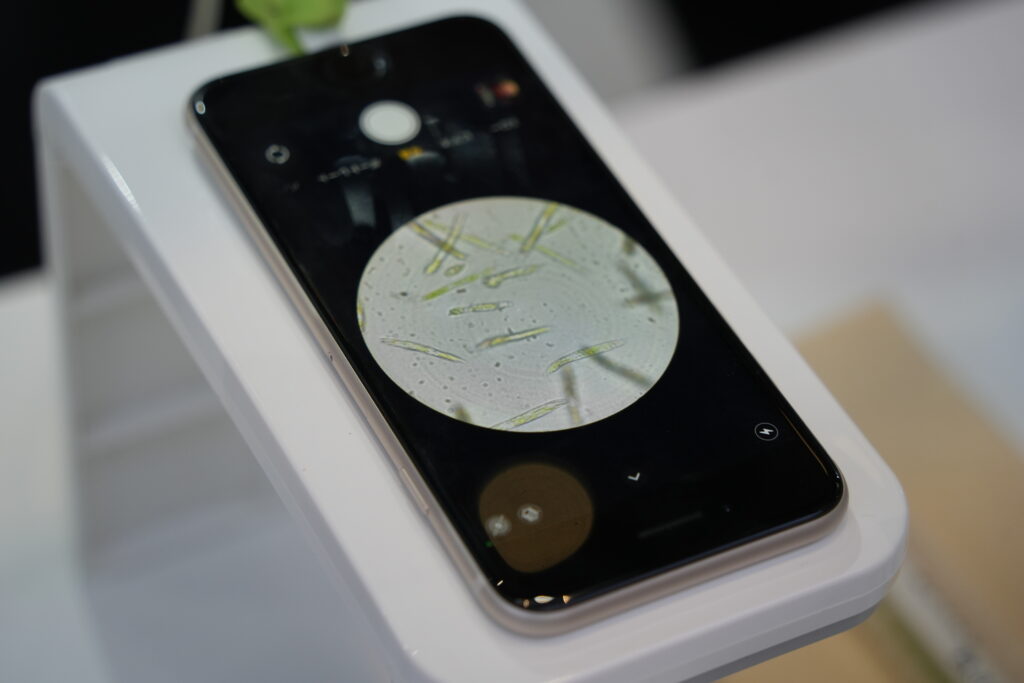 Euglena Co. captivated attendees with a hands-on experience, allowing them to view live Euglena through special smartphone attachments. This interactive setup provided a glimpse into the potential of Euglena in sustainability and scientific research.