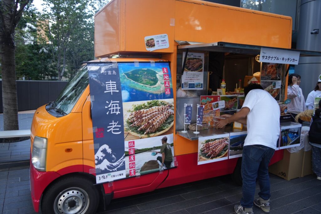 One of the main attractions was a kitchen truck offering gourmet shrimp dishes made with caridean shrimp raised by Euglena's subsidiary, Euglena Taketomi Shrimp Aquaculture Co., Ltd., which joined the Euglena Group in 2015 to bring sustainable shrimp farming to the market.